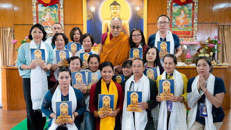 His Holiness the Dalai lama posing for one of several group photos at the conclusion of his two day meeting with Vietnamese business leaders, artists, intellectuals and members of youth delegations and groups in Vietnam by live teleconference link, at his residence in Dharamsala, HP, India on May 22, 2018. Photo by Tenzin Choejor